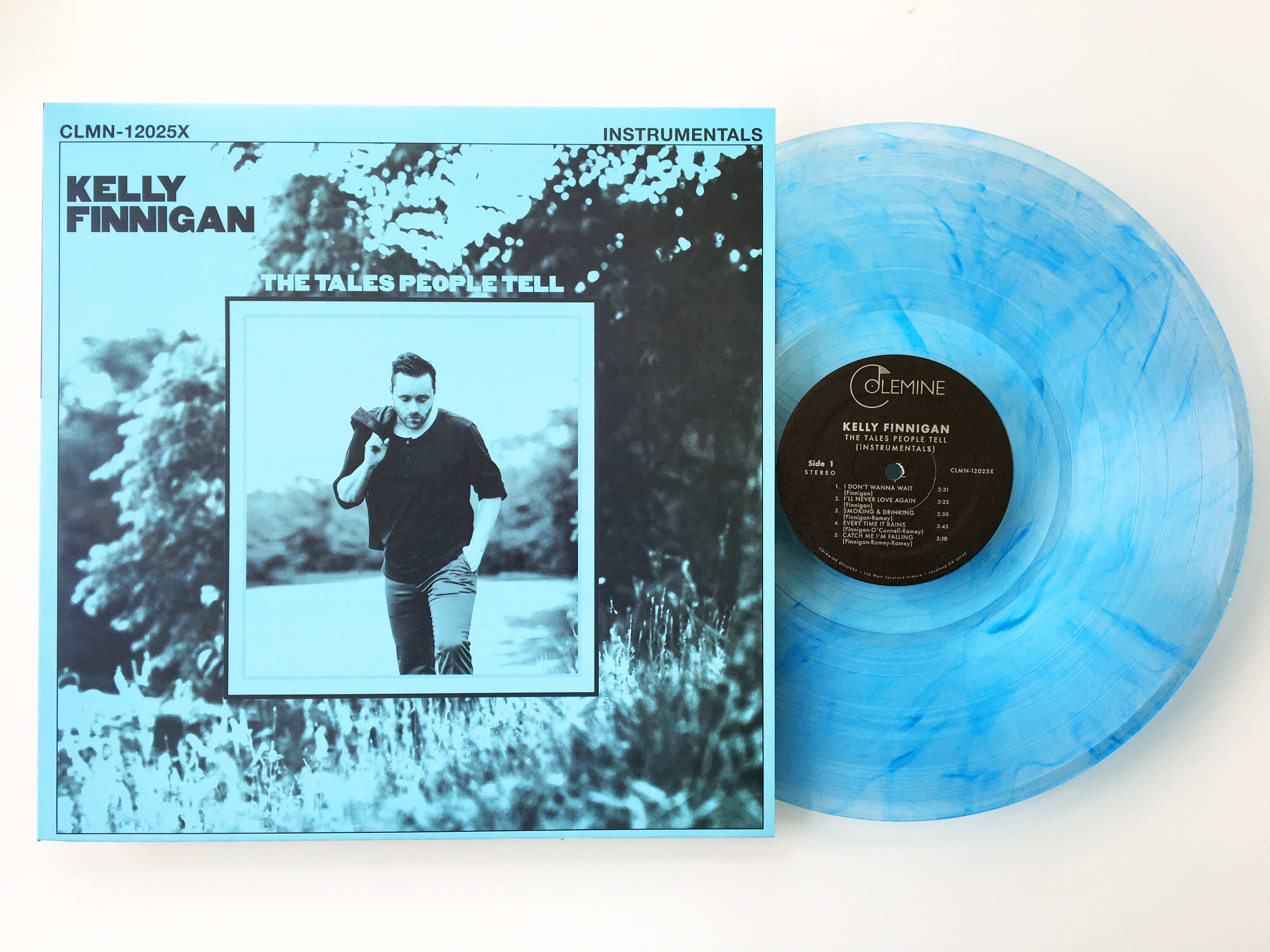 Kelly Finnigan The Tales People Tell LP blå instrumental
